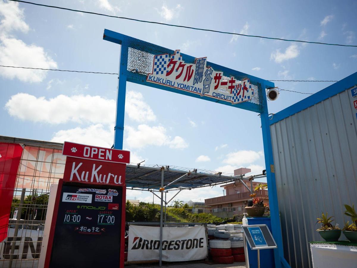 Hotel Murasakimura Yomitan Exteriör bild
