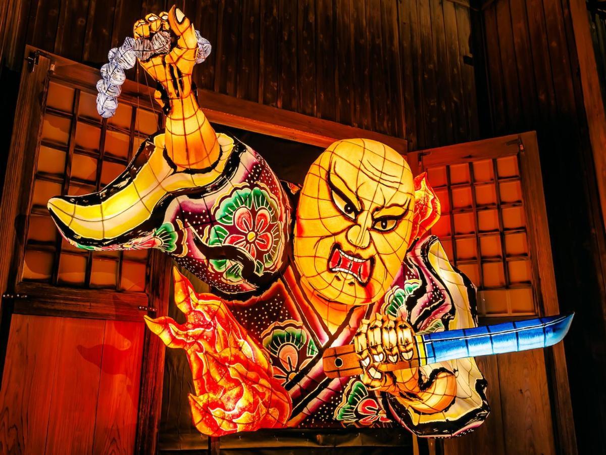 Hotel Murasakimura Yomitan Exteriör bild